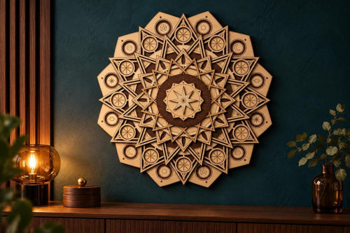 A layered wooden celestial mandala wall art piece mounted on a dark teal wall above a wooden console table.